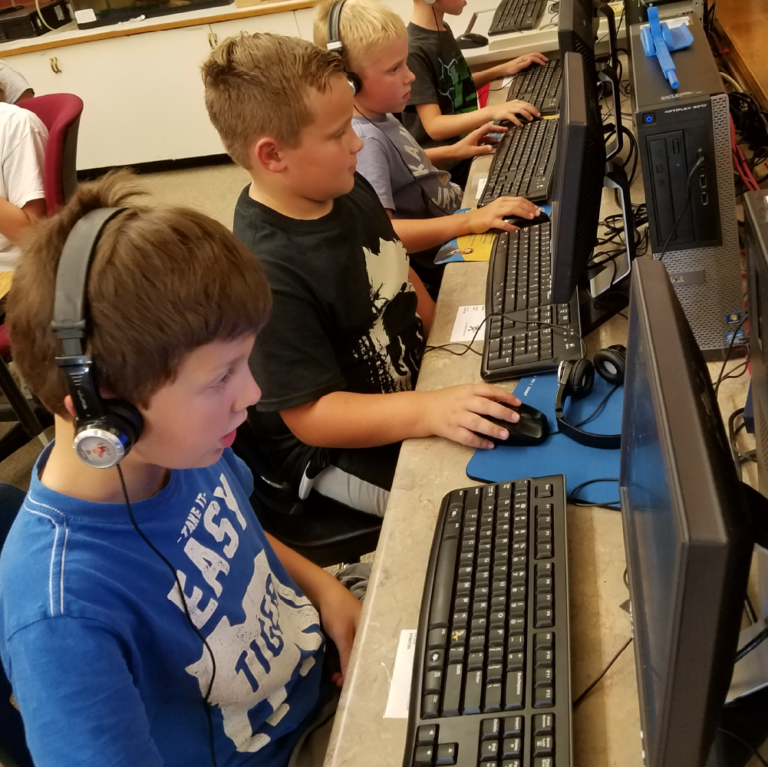 Kids work on computers as part of a Panhandle youth program